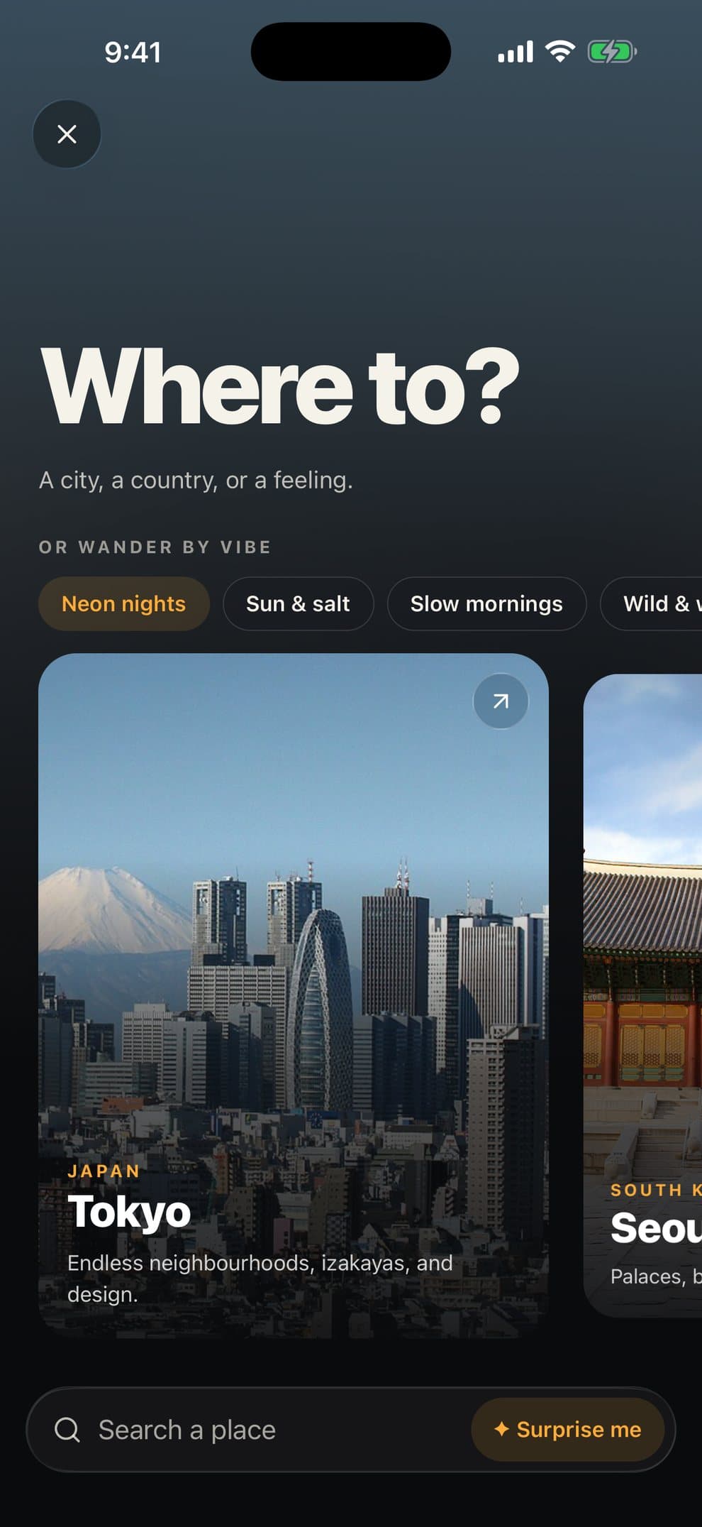 The Where to? screen with vibe chips and a Tokyo card